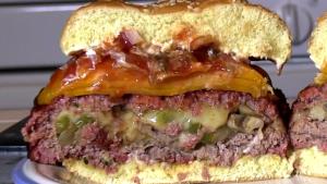 SmokingPit.com - Hickory Smoked Philly Cheese Steak Colossal Burger Stuffed with amazing flavor. The money shot! Cooked on the Yoder YS640