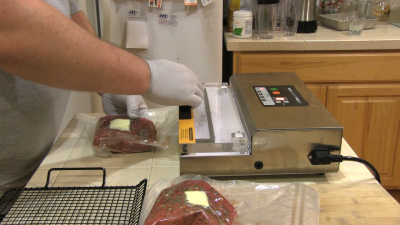SmokingPit.com - Alder Smoked Sous Vide London Broil - Vacuum packing the Steaks