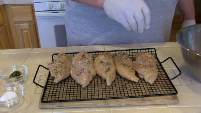 SmokigPit.com - Chicken Fettuccine Marsala Recipe - slow cooked on a Yoder YS640 Pellet smoker. - Seasoning the chicken.