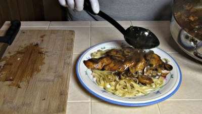 SmokigPit.com - Chicken Fettuccine Marsala Recipe - slow cooked on a Yoder YS640 Pellet smoker. -  Saucing the chicken.