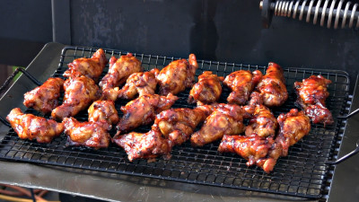 SmokingPit.com - Kentucky Bourbon Glazed Chicken Wings.  Slow cooked on the yoder YS640. Wings hot off the cooker..