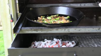 BBQ off the Scottsdale by Arizona BBQ Outfitters. This is a Santa Maria style cooker with a lid that accepts a Cast iron skillet, Cast iron Wok and a cast Iron Griddle. Saute on the Lodge Cast Iron Skillet on the Scottsdale.