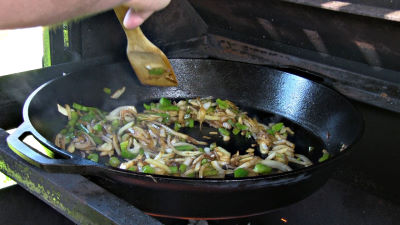 SmokingPit.com - Turkey Sausage Quesadilla recipe wood fire cooked on my Scottsdale Santa Maria style cooker. Sauteing the vegetables..