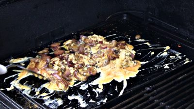 SmokingPit.com BBQ - Crimini Mushrooms, red onion, eggs, sausage, garlic sauteed in butter.  All this is stuffed into a tri tip with cheddar cheese. Griddle work.
